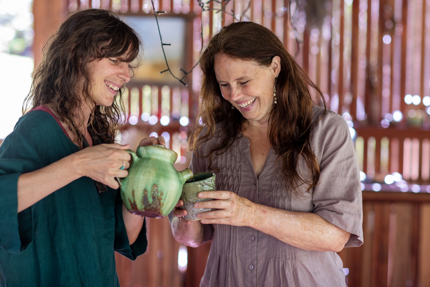 Heidi Merika and Cat Green pouring tea and talking how to study herbal remedies in Australia | Everyday Empowered