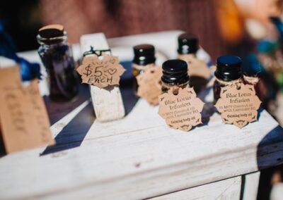 Image of HerbFerbFest - herbal products still, small bottles with cute labels. HerbFest is the Sunshine Coast's annual herbal medicine community event. Everyday Empowered