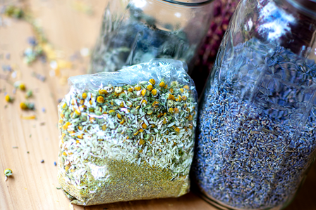 Image of jars of herbs for an article on Herbal Shelf Life: How Long Do Herbs and Herbal Remedies Last?